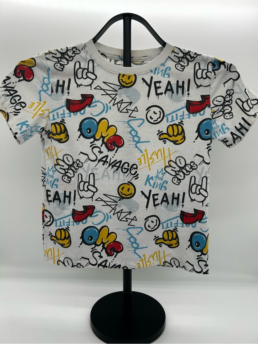 rebels White Graphic Tee with Red, Blue & Yellow Doodles Size 7
